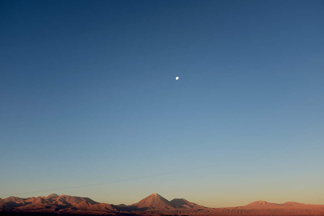 Sunset with a nice moon over the Licancabur volcano (Around San Pedro de Atacama, Chile)