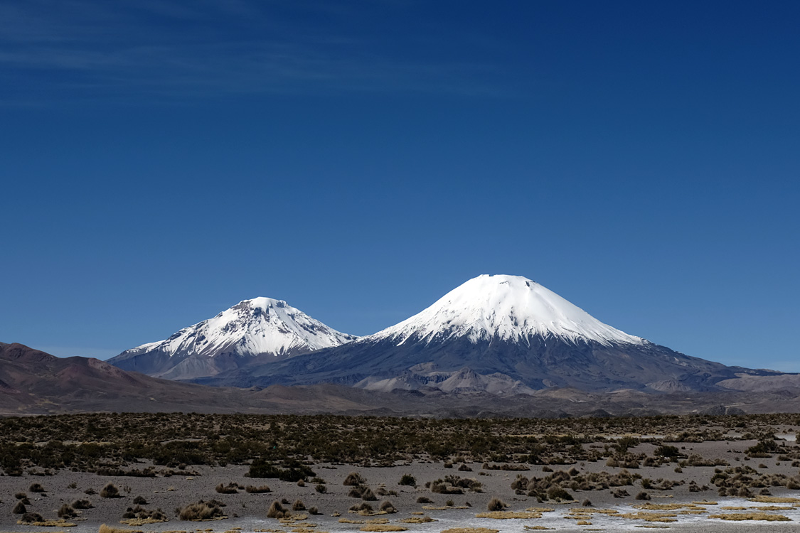 Parinacota and Pomerape volcanoes from the Road 11 (Parque Nacional Lauca)